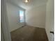 Bright and airy bedroom with neutral carpeting and large window at 4799 Astor Pl, Brighton, CO 80601