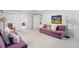 Open basement area with comfortable seating and ample space for recreation at 1040 S Elizabeth St, Denver, CO 80209