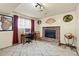 Cozy basement with a brick fireplace, creating a comfortable and inviting atmosphere at 838 S 10Th Ave, Brighton, CO 80601