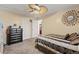 Comfortable bedroom with neutral decor, ceiling fan, and plenty of closet space at 838 S 10Th Ave, Brighton, CO 80601