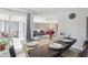 Dining room is open to the living room and has access to the patio at 3465 S Poplar St # 305, Denver, CO 80224