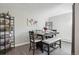 Dining room features a wooden table, bench seating and modern decor at 3465 S Poplar St # 305, Denver, CO 80224