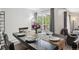 Dining room with views and a table setting for four at 3465 S Poplar St # 305, Denver, CO 80224