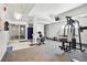 Bright community gym with a variety of equipment, locker room, and lots of natural light at 3465 S Poplar St # 305, Denver, CO 80224