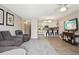 Contemporary living space with open concept, modern finishes, and plenty of natural light at 3465 S Poplar St # 305, Denver, CO 80224