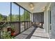 Enclosed patio featuring comfortable seating and a ceiling fan at 3465 S Poplar St # 305, Denver, CO 80224