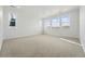 Large bedroom featuring lots of windows and plush carpeting at 16537 Black Rose Cir, Parker, CO 80134