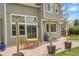 Outdoor patio with dining table and chairs, ideal for entertaining and relaxation at 6379 Holman Ct, Arvada, CO 80004