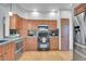 Stylish kitchen with stainless steel appliances, granite countertops, and ample storage space at 6379 Holman Ct, Arvada, CO 80004