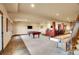 Entertaining basement featuring a pool table, bar area, and stylish slate tile flooring near walkout access at 4959 Rocky View Pt, Castle Rock, CO 80108