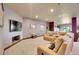 This basement living room features plush seating, TV area, with neutral colors and recessed lighting at 4959 Rocky View Pt, Castle Rock, CO 80108