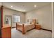 Neutral bedroom offering a calming retreat featuring natural light, with carpet flooring and a soft color palette at 4959 Rocky View Pt, Castle Rock, CO 80108