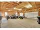 Spacious garage providing ample storage and workspace for projects and parking at 4959 Rocky View Pt, Castle Rock, CO 80108