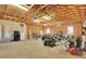 Spacious garage featuring high ceilings, ample storage, and room for multiple vehicles and equipment at 4959 Rocky View Pt, Castle Rock, CO 80108