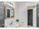 Stylish bathroom featuring modern fixtures, mirror, and design elements at 2100 N Franklin St # 20, Denver, CO 80205