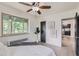 View of the light and airy bedroom with doorway to the kitchen at 2100 N Franklin St # 20, Denver, CO 80205