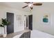 Bedroom with light-colored walls, hardwood floors, and stylish modern decor at 2100 N Franklin St # 20, Denver, CO 80205