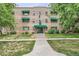 Attractive multi-Gathering building featuring awnings, landscaping, and a welcoming entrance at 2100 N Franklin St # 20, Denver, CO 80205