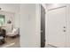 Bright hallway view leading to a cozy living room, showcasing modern interior at 2100 N Franklin St # 20, Denver, CO 80205