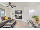 Open floor plan shows the living room and kitchen, featuring stylish decor and modern appliances at 2100 N Franklin St # 20, Denver, CO 80205