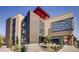 Modern exterior of the Carla Madison Recreation Center, featuring brick and glass architecture with vibrant red accents at 2100 N Franklin St # 20, Denver, CO 80205