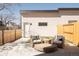 Private backyard with patio and seating area at 4201 Vallejo St, Denver, CO 80211