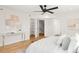 Bright bedroom with modern decor, featuring a comfortable bed and ensuite bathroom at 4201 Vallejo St, Denver, CO 80211