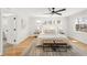 Bright primary bedroom featuring a ceiling fan and ample natural light at 4201 Vallejo St, Denver, CO 80211