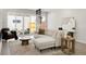 Bright living room with modern furnishings and sliding glass doors to the patio at 4201 Vallejo St, Denver, CO 80211