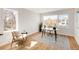 Office space with a large window, hardwood floors, modern furniture creating a productive and inviting workspace at 4201 Vallejo St, Denver, CO 80211