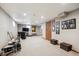 A finished basement featuring a recreation space with musical instruments and entertainment setup at 8201 Allison Ct, Arvada, CO 80005