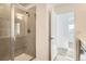 Modern bathroom with a glass-enclosed shower and sleek tile work at 370 N. Geneva St, Aurora, CO 80010
