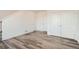 Bedroom with hardwood floors and white doors at 370 N. Geneva St, Aurora, CO 80010