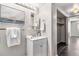 Small bathroom with vanity, toilet and closet at 3339 S Monaco Pkwy # A, Denver, CO 80222