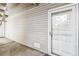 Exterior condo entryway with white door and storm door at 3339 S Monaco Pkwy # A, Denver, CO 80222