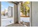Patio with views of landscaping and a nearby building at 3339 S Monaco Pkwy # A, Denver, CO 80222
