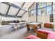 Recreation room with a billiard table, sofas, tables, and ceiling fans at 3339 S Monaco Pkwy # A, Denver, CO 80222