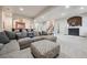 Spacious finished basement featuring living area, bar, fireplace, and staircase at 11064 Hermitage Run, Littleton, CO 80125