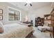 Finished basement bedroom with natural light and a cozy setting at 11064 Hermitage Run, Littleton, CO 80125