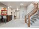 Finished basement with wet bar and staircase at 11064 Hermitage Run, Littleton, CO 80125
