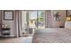 Bedroom with sliding glass doors opening to a beautiful outdoor patio at 11064 Hermitage Run, Littleton, CO 80125
