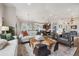 Spacious living area features elegant decor, comfortable seating, and plenty of natural light at 11064 Hermitage Run, Littleton, CO 80125
