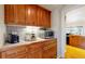 Convenient coffee bar area with ample cabinet space and modern appliances at 1977 Champions Cir, Castle Rock, CO 80104