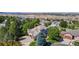 Beautifully landscaped home featuring lush greenery and a well-manicured front yard in a quiet suburban neighborhood at 1977 Champions Cir, Castle Rock, CO 80104
