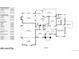 Detailed first floor plan showcasing the layout of the living spaces, kitchen, and garage at 1977 Champions Cir, Castle Rock, CO 80104