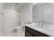 Bathroom with a bathtub shower, vanity, and modern fixtures at 6387 Agave Ave, Castle Rock, CO 80108