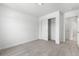 Clean bedroom with neutral carpet, closet, and white trim at 6387 Agave Ave, Castle Rock, CO 80108
