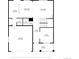 Detailed floor plan showcasing the layout of the first floor with a garage, kitchen, and living room at 6387 Agave Ave, Castle Rock, CO 80108