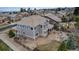 Aerial shot of a landscaped home with a covered patio and manicured lawn at 6746 S Biloxi Ct, Aurora, CO 80016
