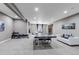 Finished basement featuring recessed lighting, a sofa, and a ping pong table at 6746 S Biloxi Ct, Aurora, CO 80016